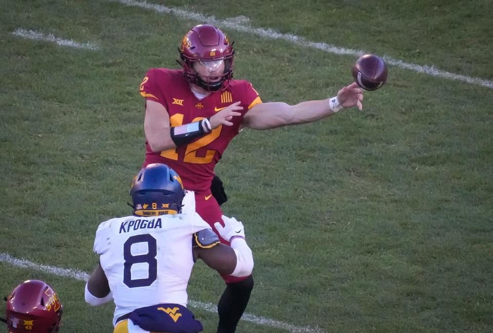 Iowa State quarterback Hunter Dekkers sidearms a pass in the fourth quarter against West Virginia during an NCAA football game at Jack Trice Stadium in Ames on Saturday, Nov. 5, 2022.