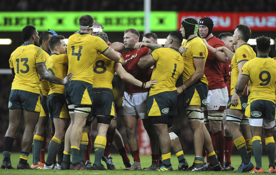 Australian and Welsh players tussle during the rugby union international match between Wales and Australia at the Principality Stadium in Cardiff, Wales, Saturday, Nov. 10, 2018. (AP Photo/Rui Vieira)