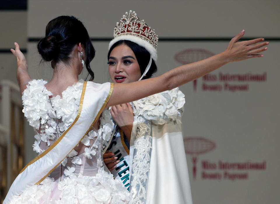 The winner of the Miss International 2016 Kylie Verzosa representing Philippines is celebrated by the winner of 2015 Edymar Martinez of Venezuela during the 56th Miss International Beauty Pageant in Tokyo