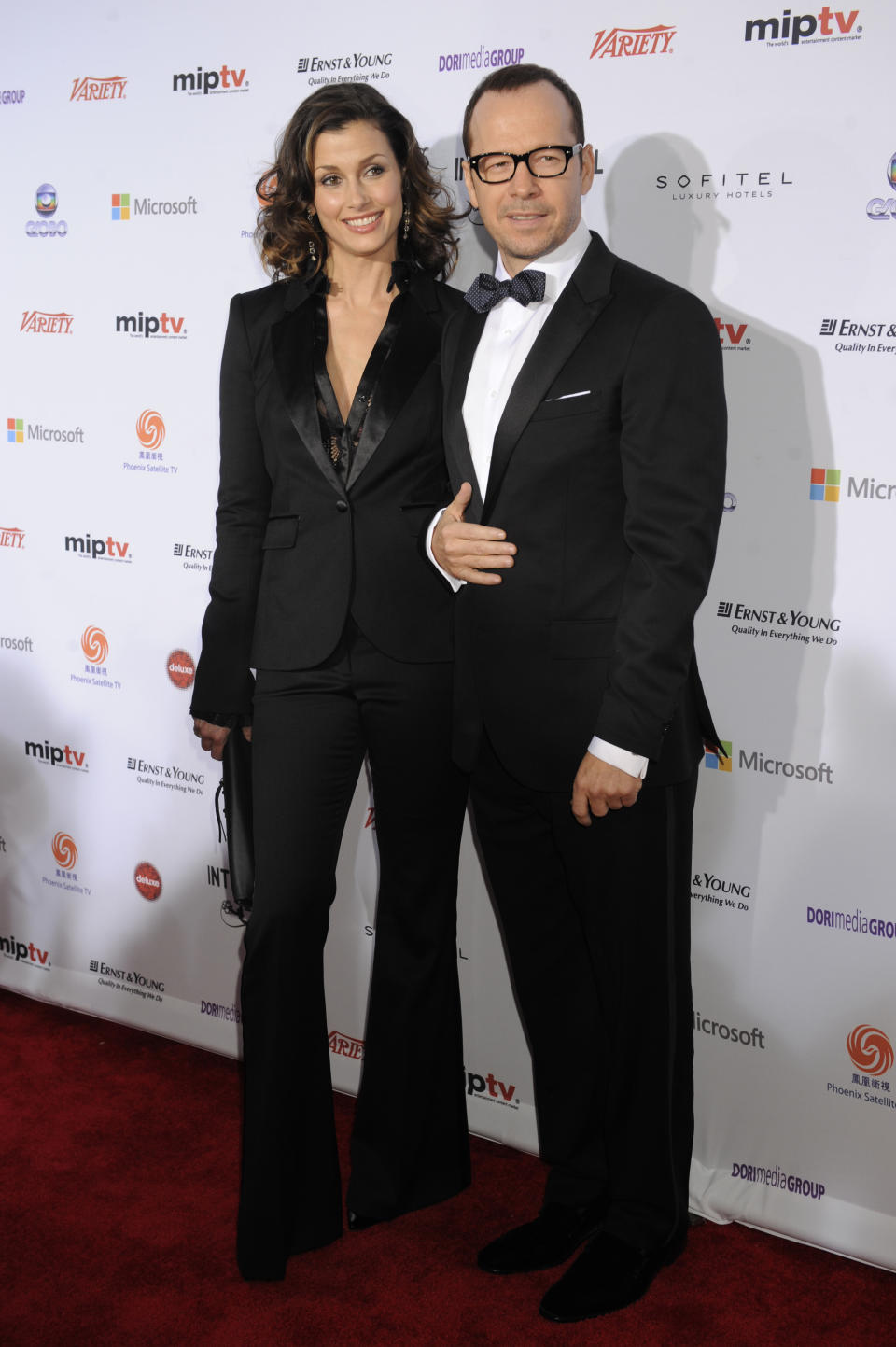 Bridget Moynihan, left, and Donnie Wahlberg of the CBS series "Blue Bloods," arrive for the 40th International Emmy Awards, Monday, Nov. 19, 2012 in New York. (AP Photo/Henny Ray Abrams)