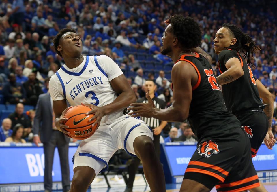 Kentucky’s Adou Thiero tries to make a shot against Georgetown College's Kyran Jones during Friday's exhibition game.