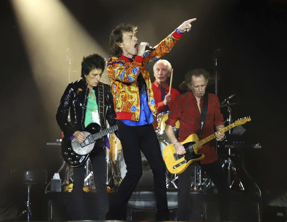 FILE - In this Aug. 5, 2019 file photo, Ronnie Wood, from left, Mick Jagger, Charlie Watts and Keith Richards of The Rolling Stones perform in East Rutherford, N.J. The Rolling Stones are postponing its 15-city North American tour because of the coronavirus. The band announced Tuesday that it's No Filter Tour, originally expected to kick off in San Diego on May 8, will no longer take place. (Photo by Greg Allen/Invision/AP, File)