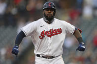 Cleveland Indians' Franmil Reyes (32) celebrates while running the bases after hitting a solo home run off Minnesota Twins starting pitcher Kenta Maeda (18) in the sixth inning of a baseball game, Tuesday, April 27, 2021, in Cleveland. (AP Photo/David Dermer)