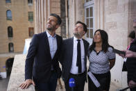 From left to right, Tony Estanguet, President of Paris 2024, Benoit Payan, Mayor of Marseille, and Deputy Mayor of Marseille, Samia Ghali, speak to press in Marseille, southern France, Tuesday, May 7, 2024. The Olympic torch will finally enter France when it reaches the southern seaport of Marseille on Wednesday. (AP Photo/Daniel Cole)
