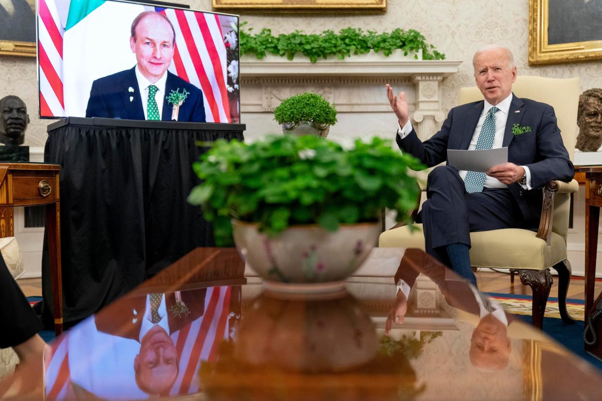 President Joe Biden speaks during a virtual meeting with Ireland's Prime Minister Micheal Martin on St. Patrick's Day in the Oval Office of the White House on Wednesday, March 17, 2021, in Washington.