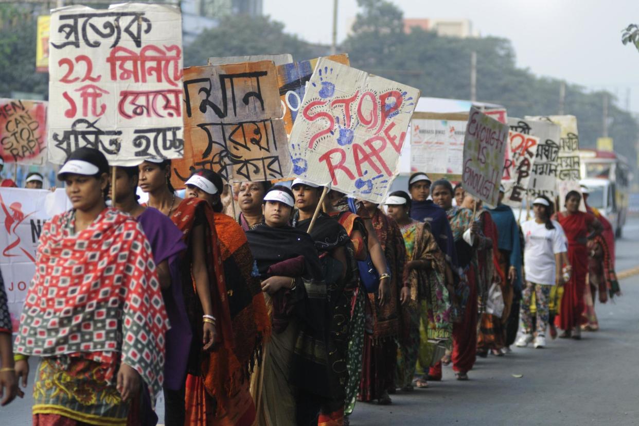 A protest against violence towards women in India: Shutterstock / arindambanerjee