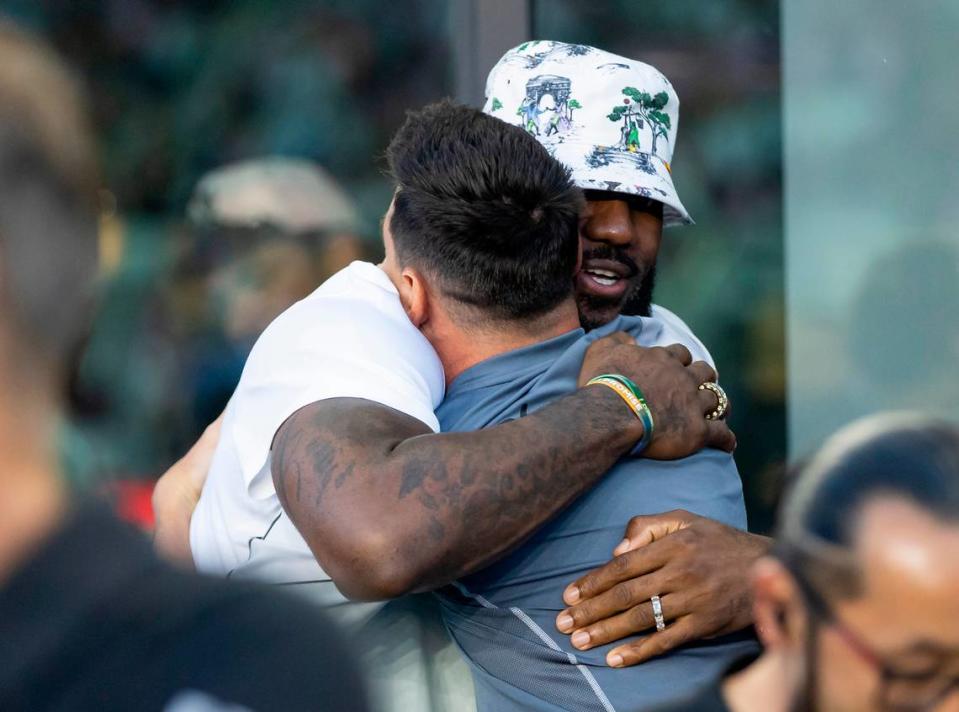 NBA player LeBron James hugs Inter Miami forward Lionel Messi (10) before the start of his Leagues Cup group stage match against Cruz Azul at DRV PNK Stadium on Friday, July 21, 2023, in Fort Lauderdale, Fla.