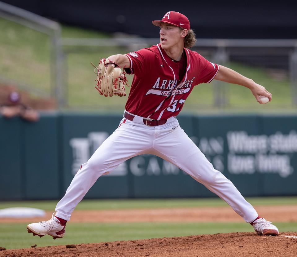 Arkansas' Hagen Smith throws against Texas A&M during an NCAA college baseball game in College Station, Texas, Saturday, April 23, 2022. (Michael Miller/College Station Eagle via AP)