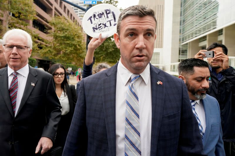 FILE PHOTO: U.S. Representative Duncan Hunter leaves federal court after pleading guilty to misusing campaign funds, in San Diego