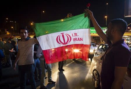 Iranians celebrate on the streets following a nuclear deal with major powers, in Tehran July 14, 2015. REUTERS/TIMA