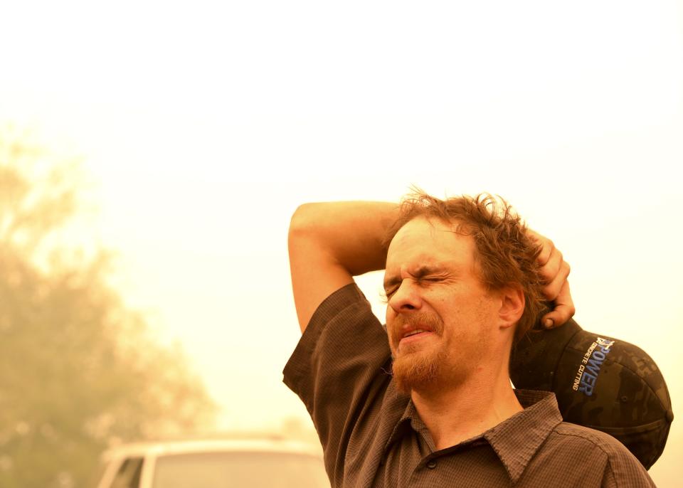 Chris Tofte gets emotional after a group of volunteers left to continue searching for his son Wyatt Tofte,13, and his dog Duke in Stayton, Oregon on Wednesday, Sept. 9, 2020.