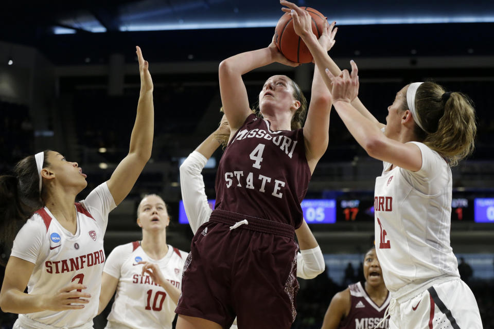 FILE - In this Saturday, March 30, 2019, file photo, Missouri State's Abby Hipp (4) shoots against Stanford's Lexie Hull (12) during the first half of a regional semifinal game in the NCAA women's college basketball tournament, in Chicago. In the first week of December 2019, Missouri State is ranked for the first time in 15 years. Hipp is one of the team's returning players from a squad that reached last season's Sweet 16. (AP Photo/Kiichiro Sato, File)