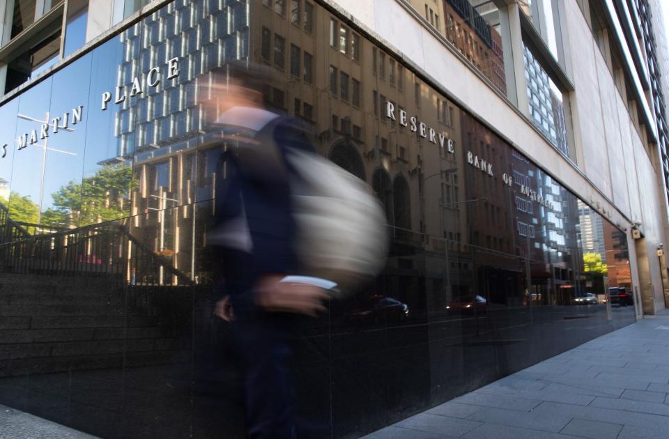 SYDNEY, Nov. 3, 2020 -- A man walks past the Reserve Bank of Australia in Sydney, Australia, Nov. 3, 2020. The Reserve Bank of Australia RBA slashed the country's official interest rate from 0.25 percent to a fresh record low of 0.1 percent at its monthly meeting on Tuesday. (Photo by Hu Jingchen/Xinhua via Getty) (Xinhua/Hu Jingchen via Getty Images)