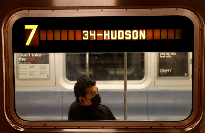 Commuters ride subway in Manhattan on first day of phase one reopening in New York City