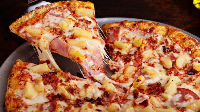 Big pizza with ham and pineapple