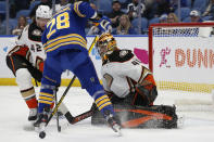 Buffalo Sabres center Zemgus Girgensons (28) is stopped by Anaheim Ducks goaltender Anthony Stolarz (41) during the first period of an NHL hockey game Tuesday, Dec. 7, 2021, in Buffalo, N.Y. (AP Photo/Jeffrey T. Barnes)