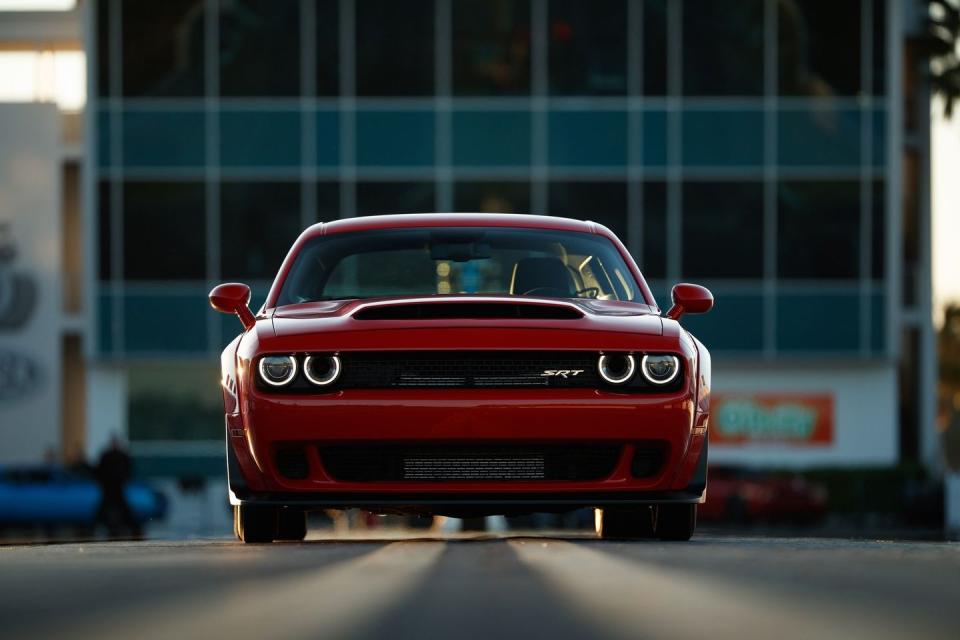 <p>The <a href="https://www.roadandtrack.com/car-culture/a15933028/don-garlits-dodge-challenger-srt-demon/" rel="nofollow noopener" target="_blank" data-ylk="slk:Challenger SRT Demon's;elm:context_link;itc:0;sec:content-canvas" class="link ">Challenger SRT Demon's</a> "air grabber" intake spans a massive portion of the hood, allowing it to suck in enough air for its supercharged V-8 to produce 840 horsepower. <a href="https://www.ebay.com/itm/2018-Challenger-SRT-Demon/114194554329?hash=item1a96869dd9:g:LEEAAOSwBYtenwjK" rel="nofollow noopener" target="_blank" data-ylk="slk:Here's one;elm:context_link;itc:0;sec:content-canvas" class="link ">Here's one</a> with just over 1000 miles on the clock up for grabs on eBay. </p>
