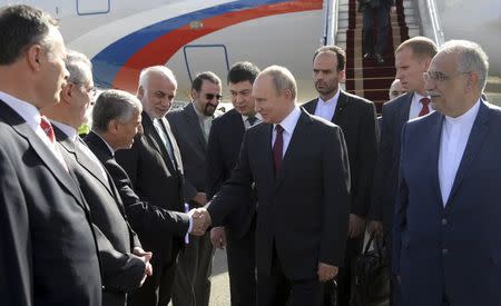 Russian President Vladimir Putin upon his arrival at the airport of Tehran. Sputnik/Alexei Druzhinin/Kremlin via REUTERS
