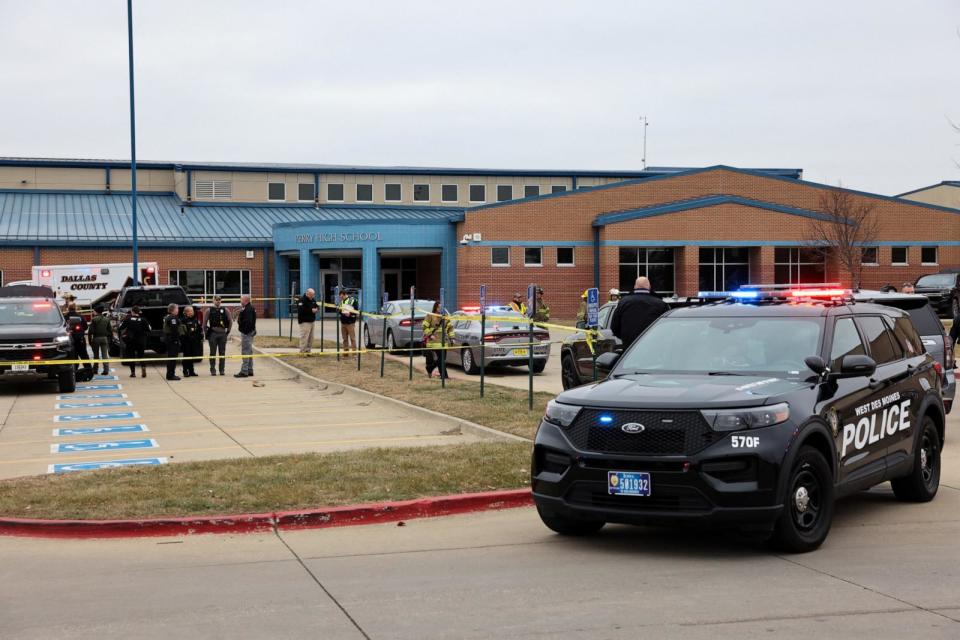 PHOTO: Law enforcement officers work at the scene of a shooting at Perry High School in Perry, Iowa, January 4, 2024. (Scott Morgan/Reuters)