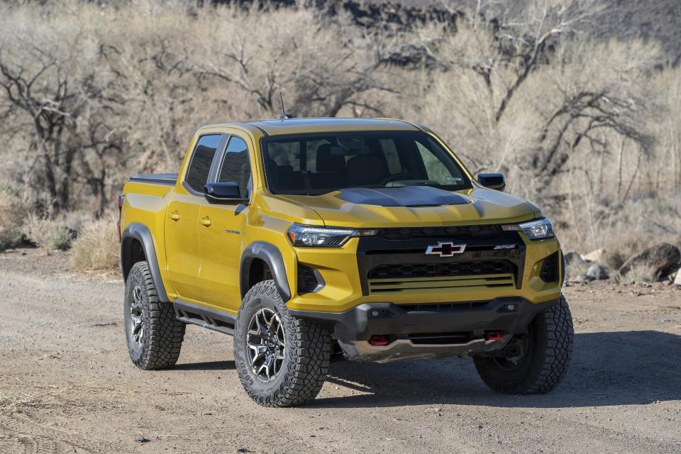 This photo provided by Chevrolet shows the 2023 Colorado ZR2. The ZR2 is primed for off-road driving thanks to knobby tires, extra underbody skidplates and more. (Courtesy of General Motors via AP)