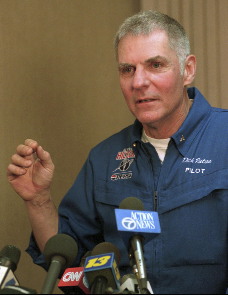 FILE - Balloonist Dick Rutan talks about the short flight of the Global Hilton balloon at a news conference in Albuquerque, N.M., Friday, Jan. 9, 1998. Rutan, a decorated Vietnam War pilot, who along with copilot Jeana Yeager completed one of the greatest milestones in aviation history: the first round-the-world flight with no stops or refueling, died late Friday, May 3, 2024. He was 85. (AP Photo/Jake Schoellkopf, File)