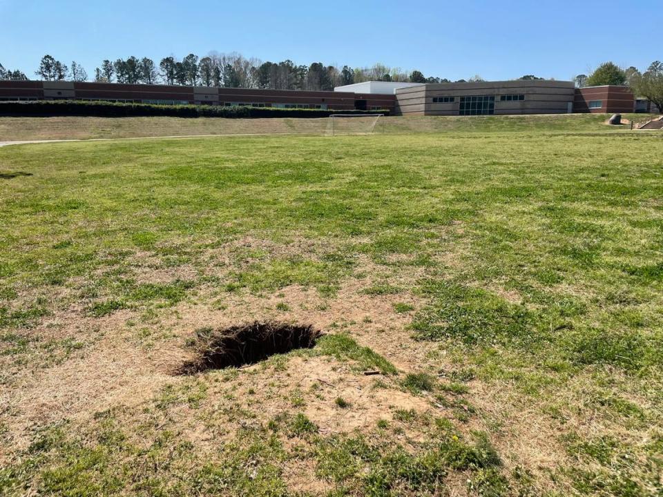 Overflowing of the plumbing recently led to a massive hole forming at West Cary Middle School’s athletic field. Parents and teachers want major renovations made to the school campus.