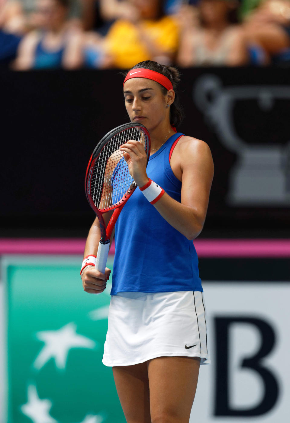 France's Caroline Garcia reacts as she plays Australia's Ashleigh Barty during their Fed Cup tennis final in Perth, Australia, Saturday, Nov. 9, 2019. (AP Photo/Trevor Collens)