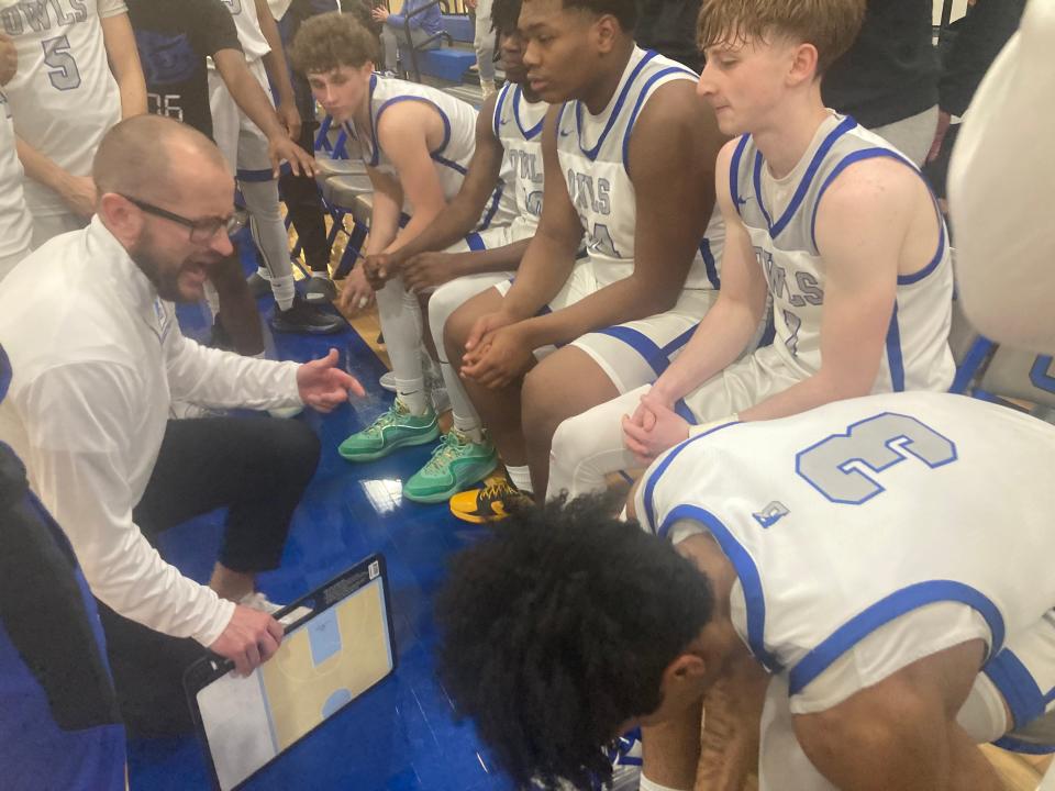 Bensalem head coach Ron Morris talks to starters, from left, Noah Morris, Nate Cooper, Jaidyn Moffitt, Antonio Morris and Micah White during halftime of Tuesday's 46-44 win over Neshaminy.