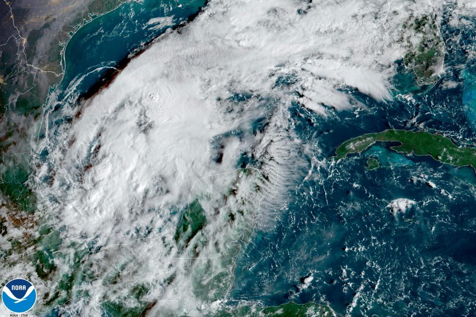 This satellite image taken at 9:30am ET and provided by NOAA shows Tropical Storm Karl in the Gulf of Mexico, on Wednesday, Oct. 12, 2022. Karl grew a little stronger off Mexico’s southern Gulf coast on Wednesday and was expected to approach land by the weekend without gaining hurricane strength.