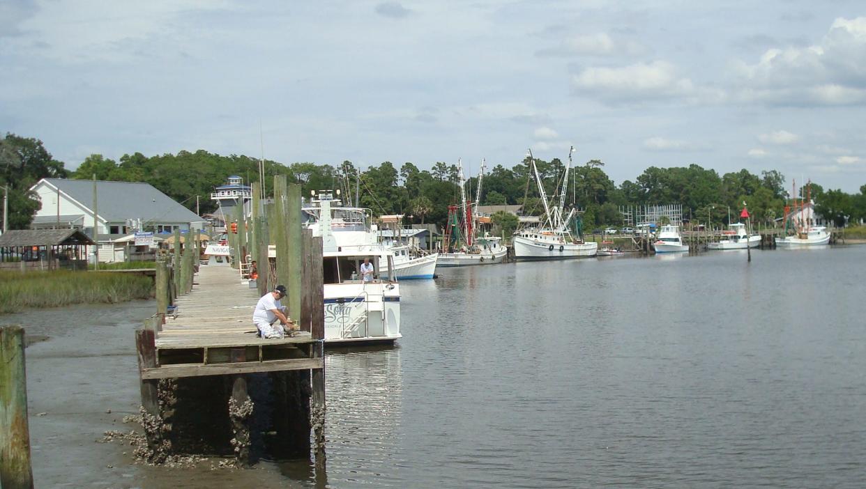 Calabash’s picturesque riverfront offers a mix of of fishing boats and restaurants.
