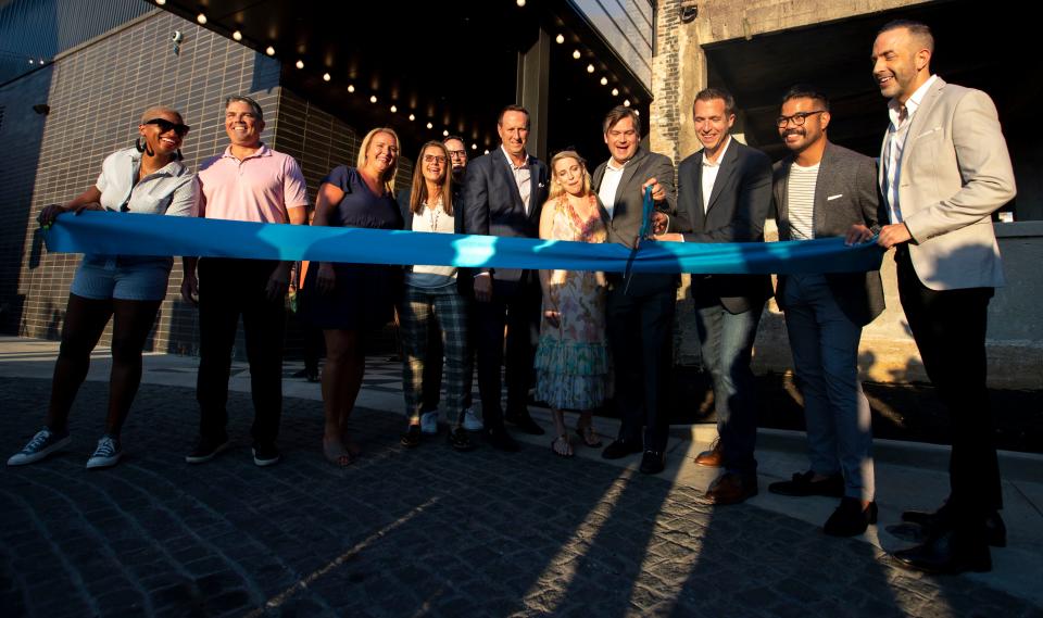 A ribbon cutting is held during the Hyatt Caption grand opening ceremony Thursday, July 14, 2022, in Memphis.