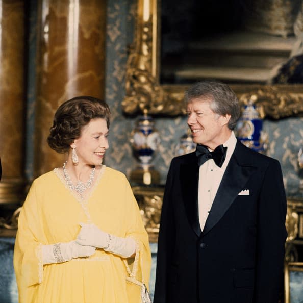 <div class="inline-image__caption"><p>The Queen with American President Jimmy Carter at a State Dinner at Buckingham Palace.</p></div> <div class="inline-image__credit">PA Images via Getty Images</div>