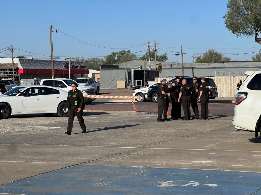 Law enforcement is gathered during the first court appearance of the four suspects accused in the murder of wo Kansas women. It is happening in Texas County, Oklahoma. (KSN Photo)