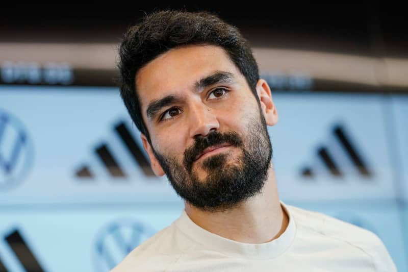 Germany's Ilkay Guendogan reacts during a press conference. Uwe Anspach/dpa
