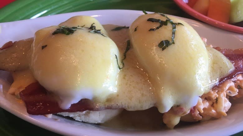 eggs Benedict with bacon and pimento cheese