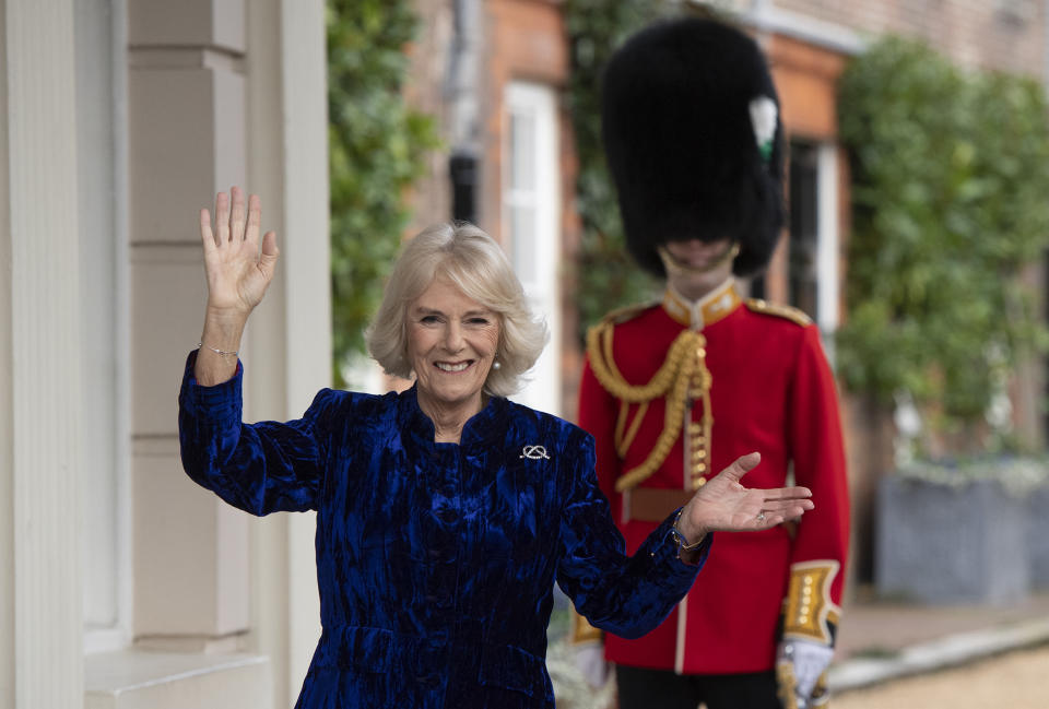 LONDON, ENGLAND - DECEMBER 16: Camilla, Duchess of Cornwall waves off The Royal Brougham accompanied by Captain Charles Ross Assistant Equerry as the Duchess of Cornwall decorates the Clarence House Christmas Tree virtually with children from Helen & Douglas House Hospice, on December 16, 2020 in London, England. (Photo by Eddie Mulholland - WPA Pool/Getty Images)