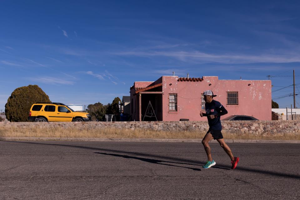 Gonzalo Espinoza, a groundskeeper for Ysleta ISD, trains for the El Paso Marathon on the streets of Central El Paso on Friday, Feb. 3, 2023. Espinoza finished in the top 10 in the past two El Paso Marathons.