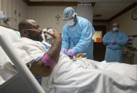 COVID-19 patient Cedric Daniels, 37, of Gonzales, La., recuperates at Our Lady of the Lake Regional Medical Center in Baton Rouge, Monday, Aug. 2, 2021. Louisiana is leading the nation in the number of new COVID cases per capita and remains one of the bottom five states in administering vaccinations. (AP Photo/Ted Jackson)