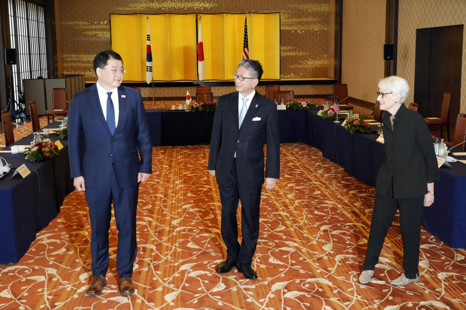 U.S. Deputy Secretary of State Wendy Sherman, right, South Korean First Vice Foreign Minister Choi Jong Kun, left, with Japanese Vice-Minister for Foreign Affairs Takeo Mori, center, pose for photographers prior to their trilateral meeting at the Iikura Guesthouse Wednesday, July 21, 2021, in Tokyo. (AP Photo/Eugene Hoshiko)