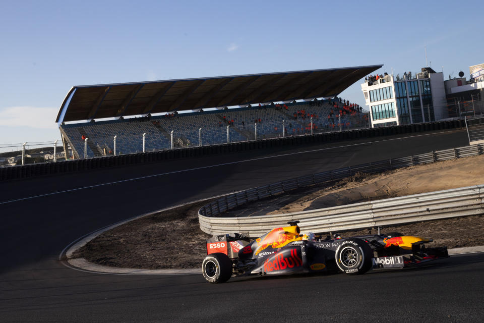 - FILE - In this Wednesday, March 4, 2020, file image, F1 driver Max Verstappen of The Netherlands drives his car through one of the two banked corners during a test and official presentation of the renovated F1 track in the beachside resort of Zandvoort, western Netherlands. The iconic Monaco Grand Prix was added Thursday to a growing list of Formula One races to be postponed because of the coronavirus outbreak. The first seven races of the Formula One season have now been postponed, with Netherlands and Spain joining Monaco as the latest to be called off. For most people, the new coronavirus causes only mild or moderate symptoms, such as fever and cough. For some, especially older adults and people with existing health problems, it can cause more severe illness, including pneumonia. (AP Photo/Peter Dejong, File)