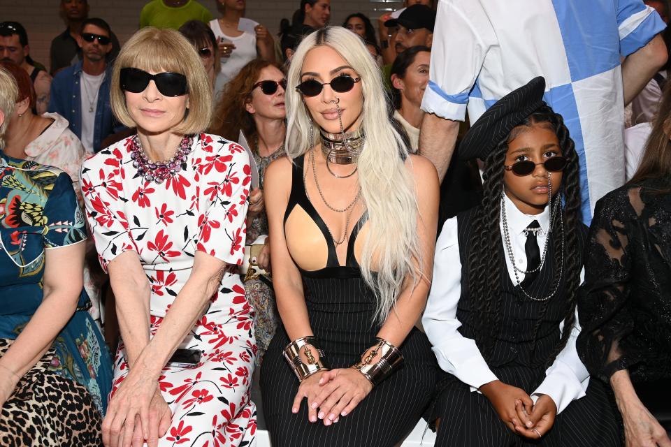 Anna Wintour, Kim Kardashian and North West attend the Gaultier Haute Couture Paris Fashion Week show.