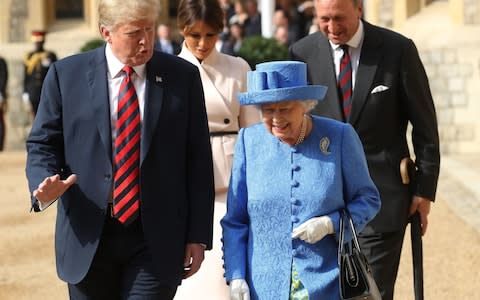 Donald Trump met the Queen during a working visit last year  - Credit: PA