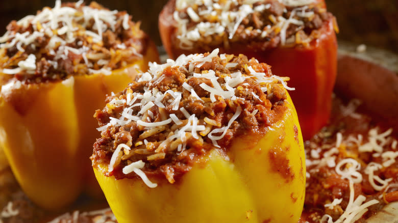 three stuffed peppers with meat