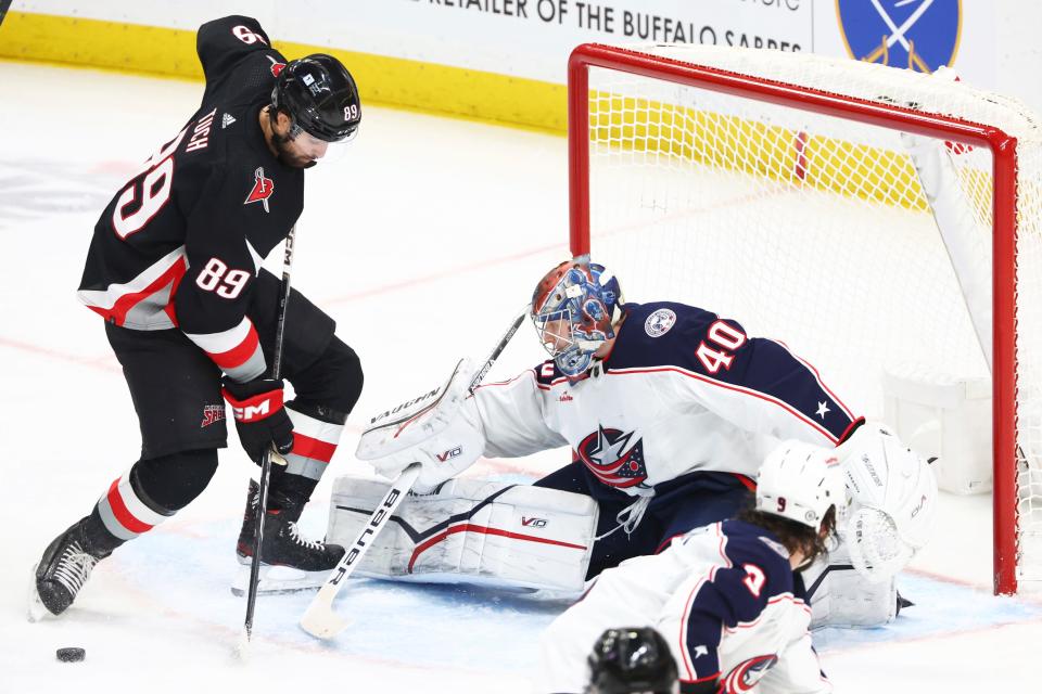 Colorado Avalanche goaltender Alexandar Georgiev (40) stops Buffalo Sabres right wing Alex Tuch (89) during the third period of an NHL hockey game Tuesday, Dec. 19, 2023, in Buffalo, N.Y. (AP Photo/Jeffrey T. Barnes)