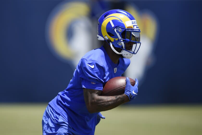 Los Angeles Rams' Cam Akers runs drills during NFL football practice in Thousand Oaks, Calif., Thursday, May 27, 2021. (AP Photo/Kelvin Kuo)