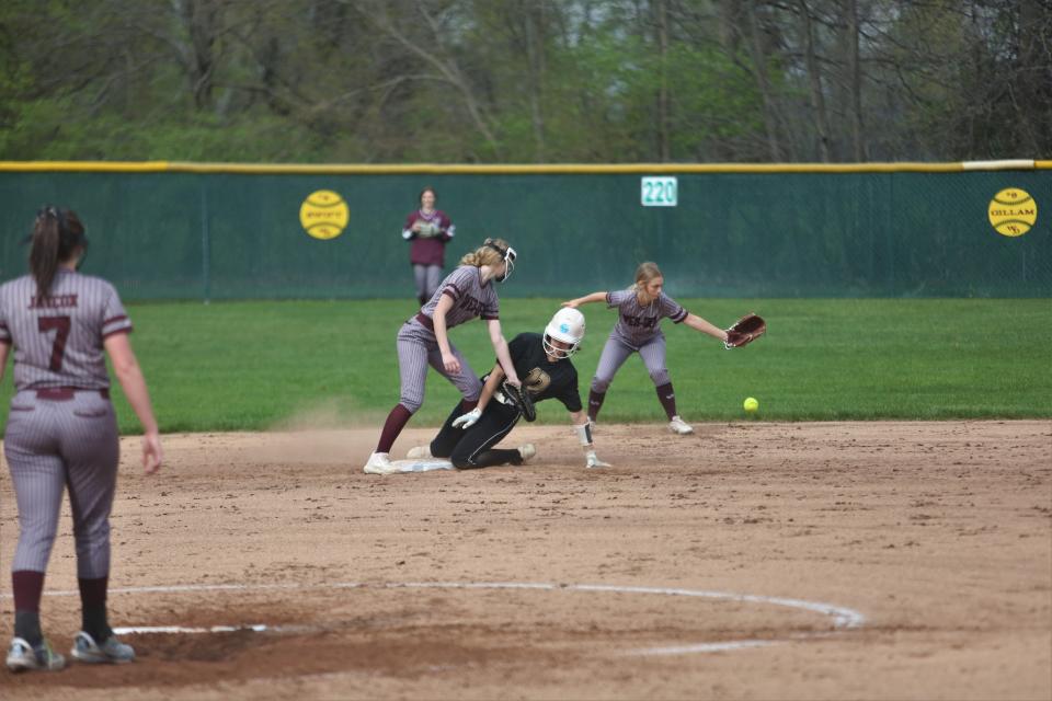 Daleville freshman Valyn Pattengale steals second base in the first round of the 2022 Delaware County softball tournament at Wes-Del High School on Wednesday, May 4, 2022.