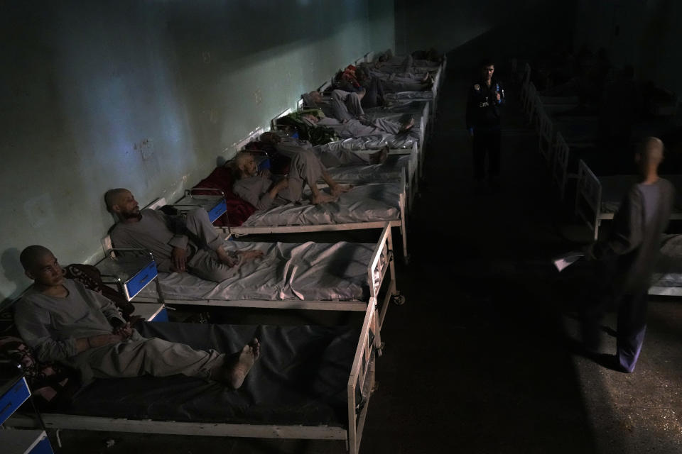 Drug addicts rest on their bed in the detoxification ward of a drug treatment camp, in Kabul, Afghanistan, Sunday, May 29, 2022. Drug addiction has long been a problem in Afghanistan, the world’s biggest producer of opium and heroin. The ranks of the addicted have been fueled by persistent poverty and by decades of war that left few families unscarred. (AP Photo/Ebrahim Noroozi)