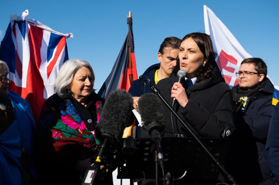 Yuliya Kovaliv, ambassador of Ukraine to Canada, speaks during a rally in Ottawa Feb. 20, 2023 marking one year since the start of the Russian invasion.