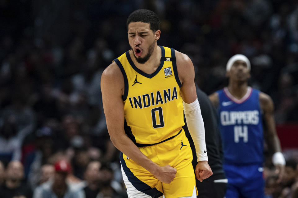 Indiana Pacers guard Tyrese Haliburton (0) reacts during the first half of an NBA basketball game against the Los Angeles Clippers, Monday, March 25, 2024, in Los Angeles. (AP Photo/William Liang)