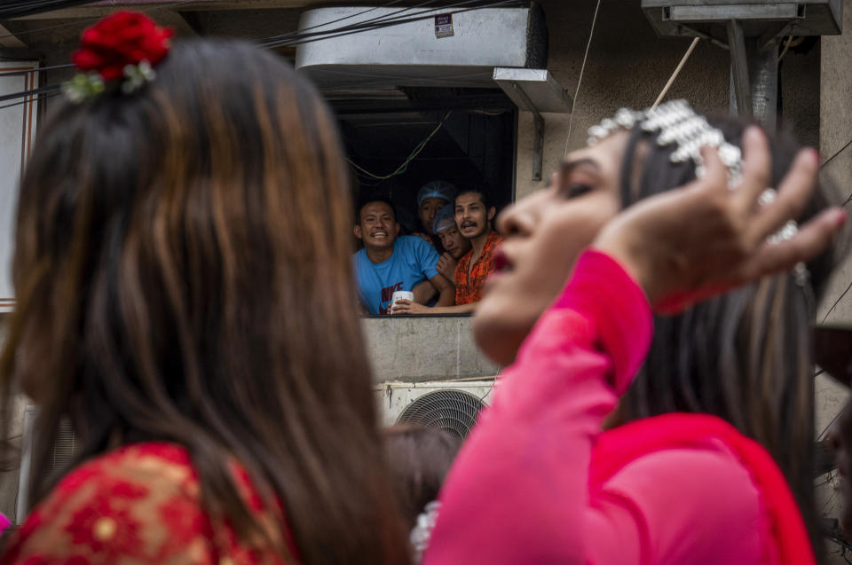 Samesex couples and LGBTQ+ activists rally in Nepal's capital during